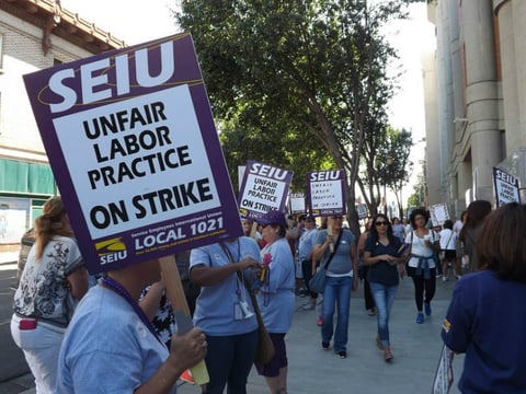 San Joaquin County employees picketed in downtown Stockton in July 2016.
